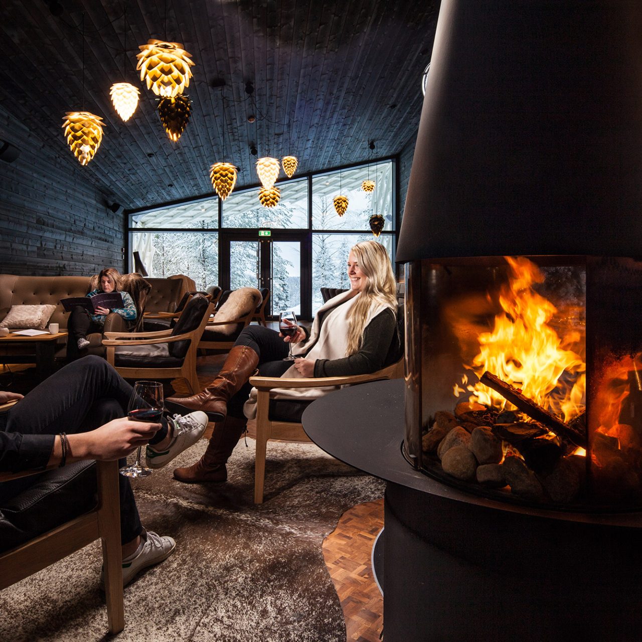 Arctic TreeHouse Hotel Lounge fireplace