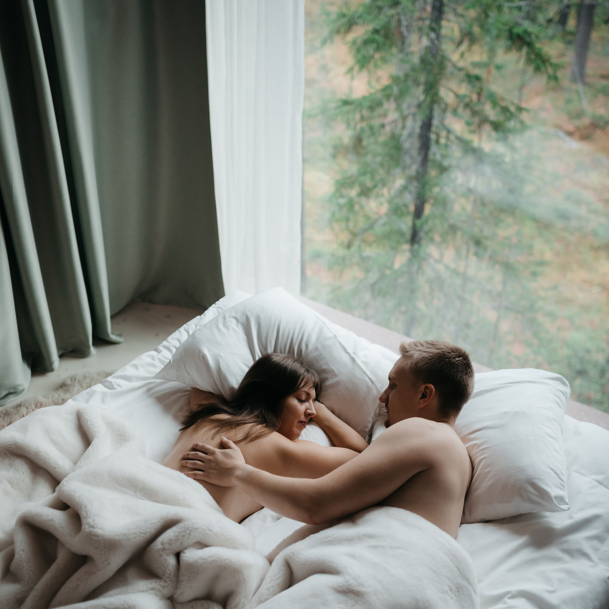 Couple enjoying the morning in bed
