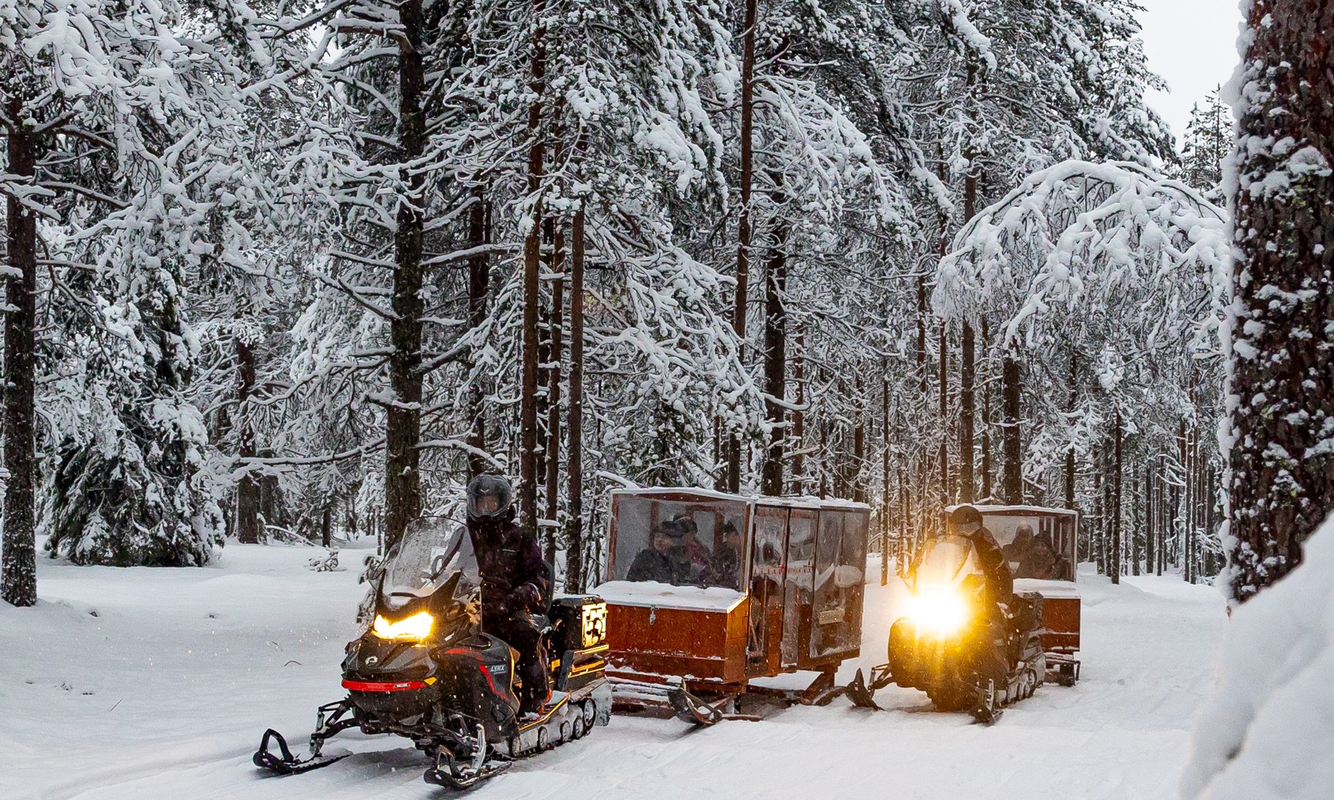 Snowmobile experience in Finnish Lapland.