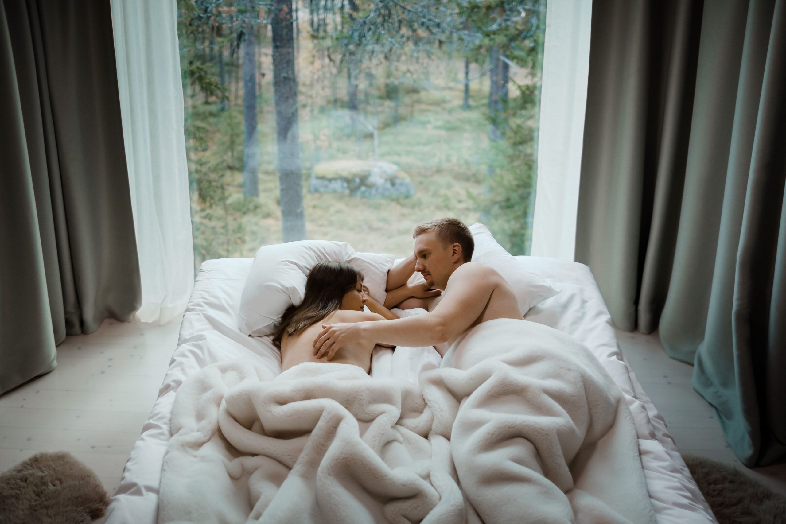 Couple enjoying the holiday in bed.
