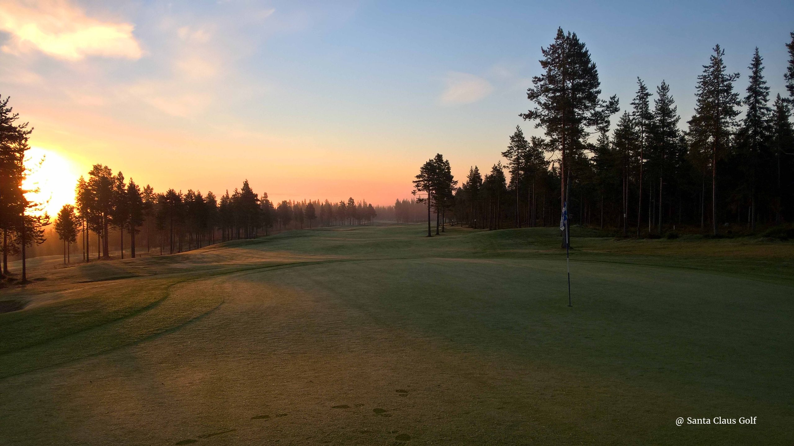 Golf field under the midnight sun at Arctic Circle Rovaniemi