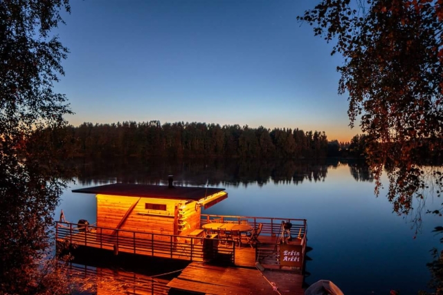 Saunaboat in Finnish summer night in Rovaniemi Finland.