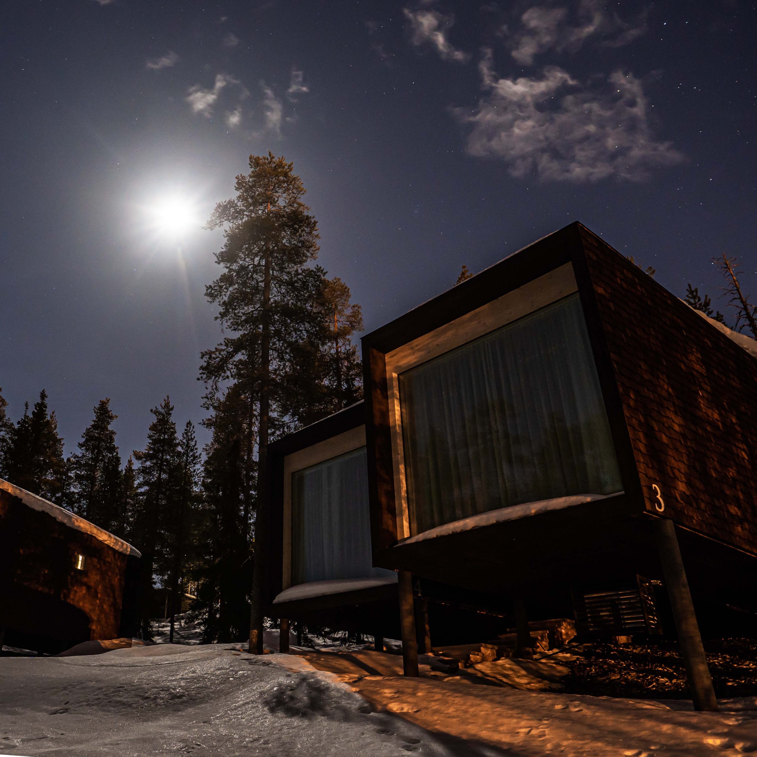 Moon at the night sky at Arctic TreeHouse Hotel