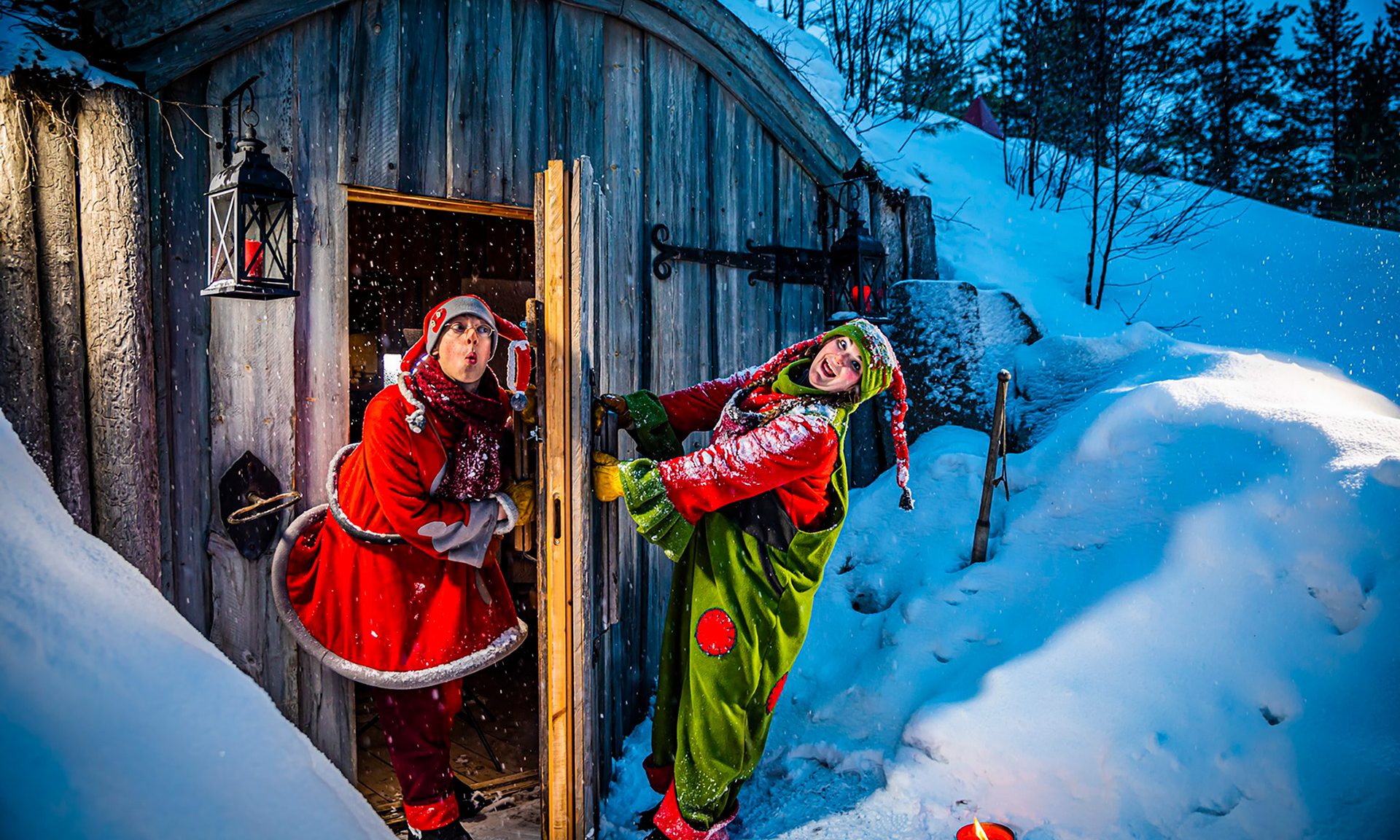 Elves in front of the Command Centre door at the Santa Claus Secret Forest.