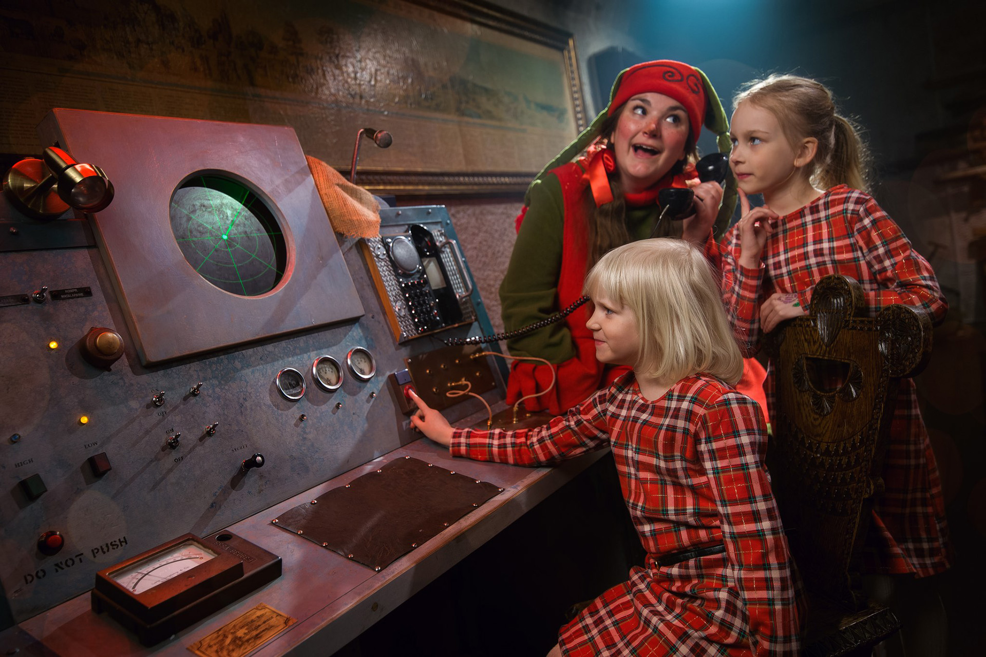 Elves and children getting to know Santa's secret command centre in Santa Claus Secret Forest - Joulukka.