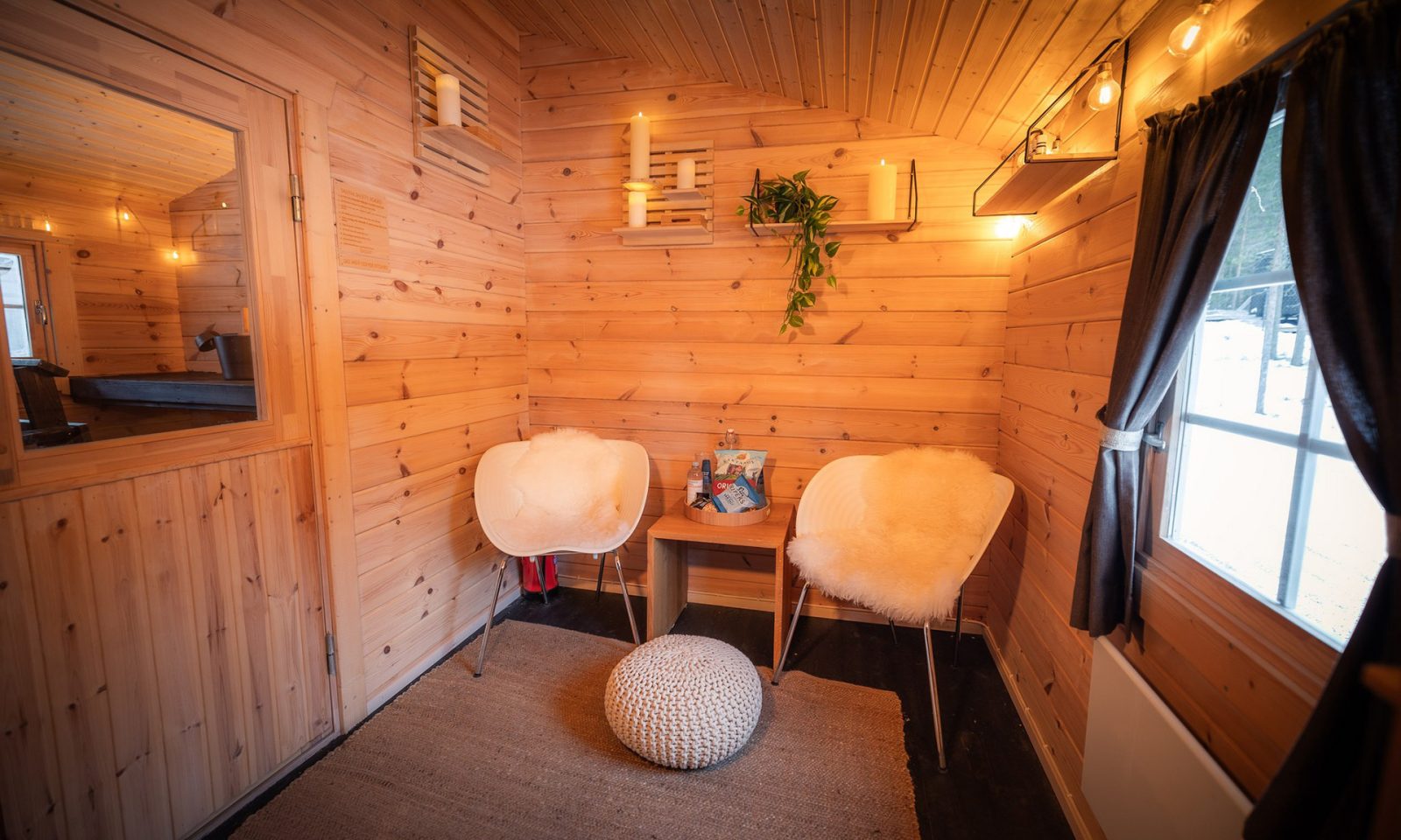 Lounge area of the traditional Lappish Sauna at the Arctic TreeHouse Hotel.