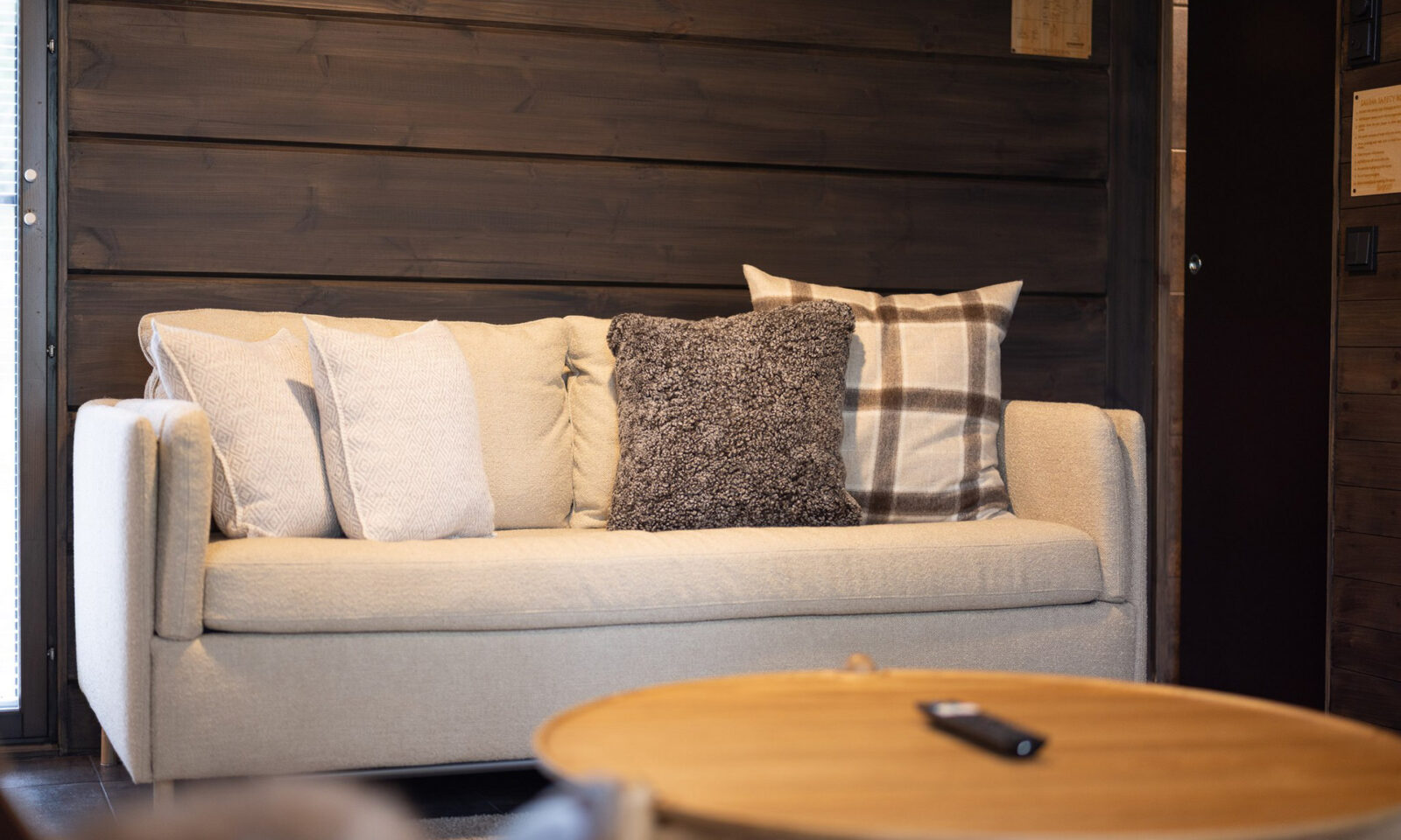 Arctic Glass House lounge area with sofa.